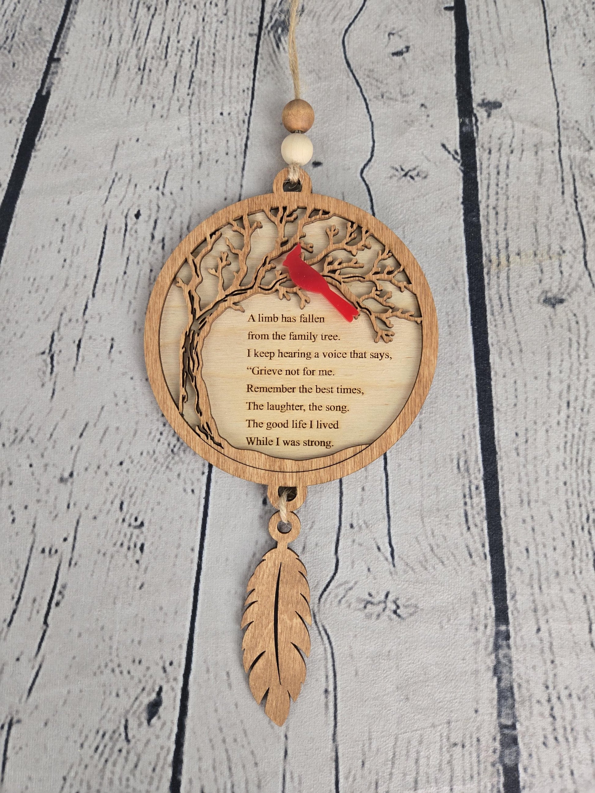 ayered wood memorial ornament close up laser engraved cardinal tree design sympathy gift detail