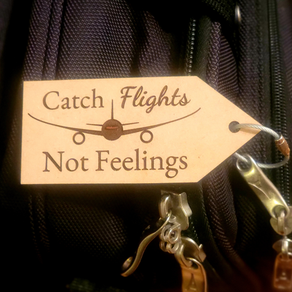 Catch flights Not Feelings bag tag